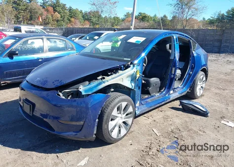 2022 Tesla Model Y Long Range Dual Motor All-Wheel Drive z USA, uszkodzony, nr VIN 7SAYGDEEXNF307424